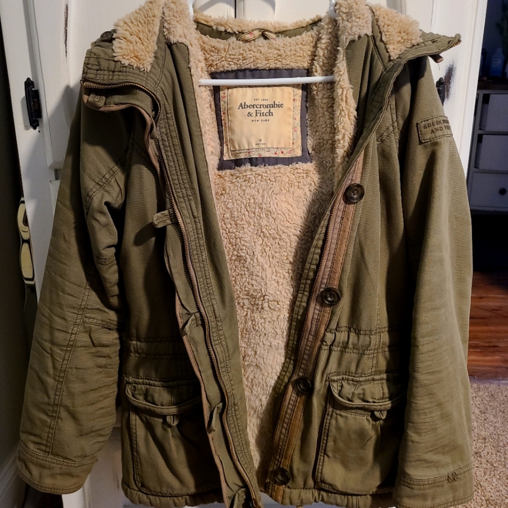 Heavy, warm, sherpa lined jacket.